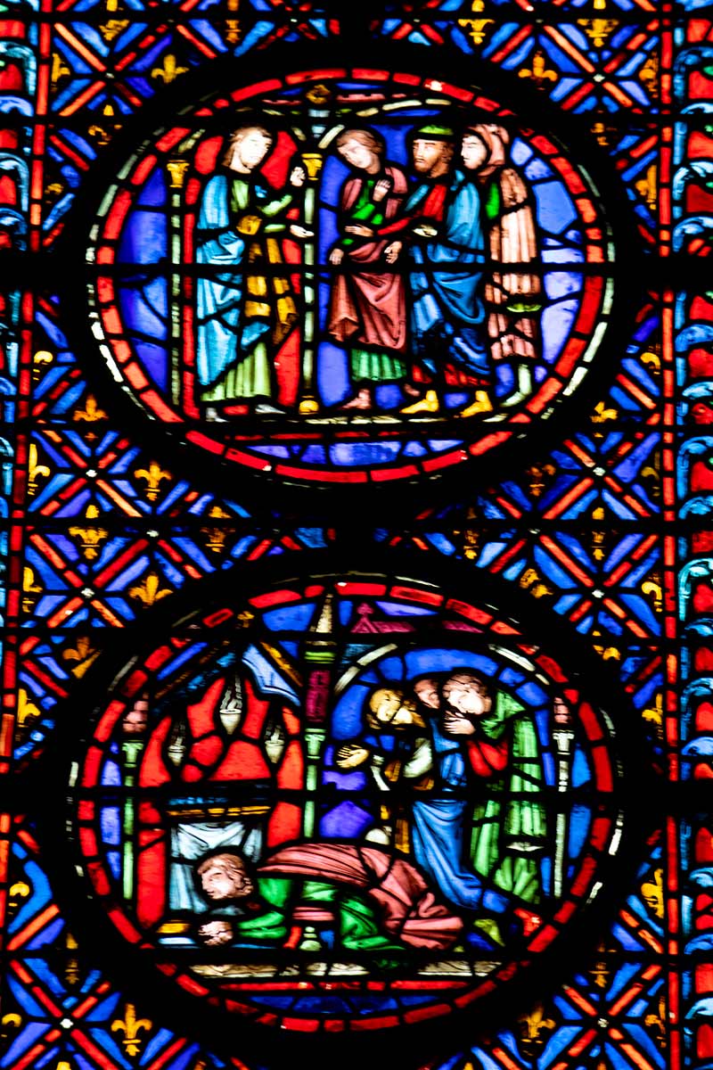 Visiting La Sainte Chapelle Paris: A complete guide Image of stained glass panels in Sainte Chapelle Paris